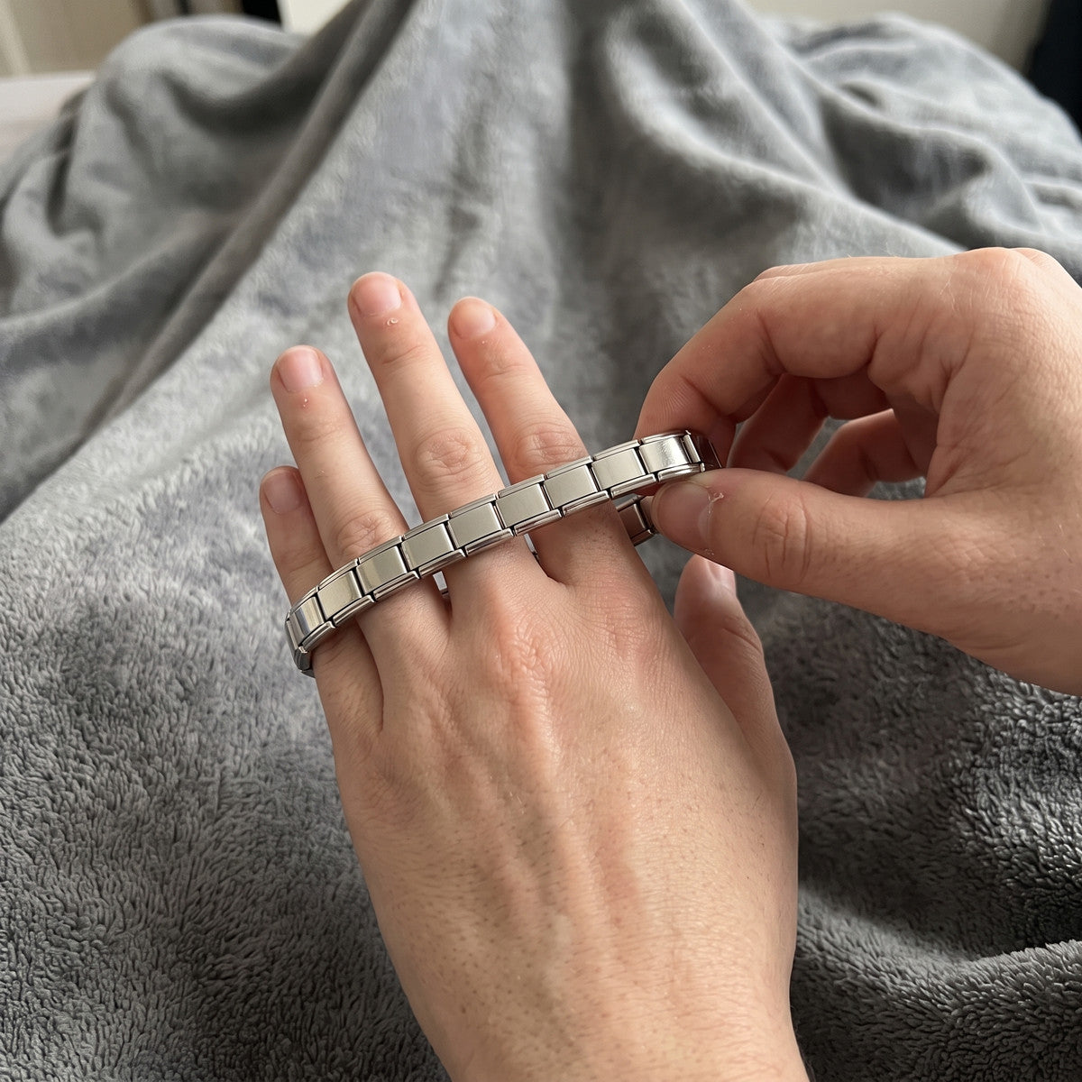 Little Links stainless steel bracelet in an everyday styling scene 2