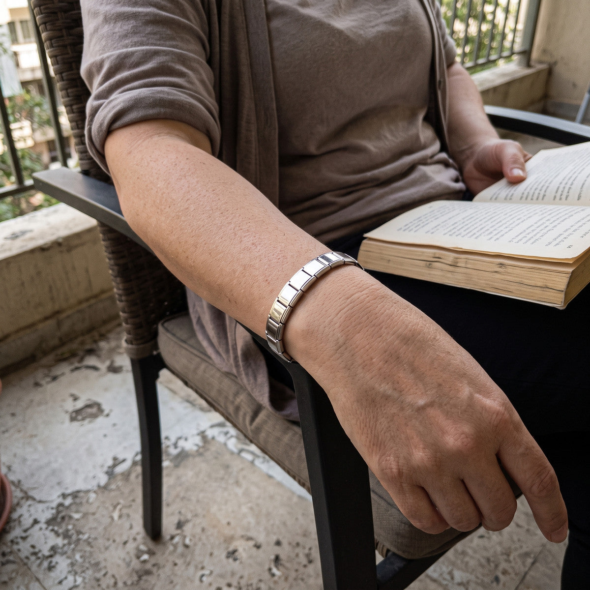 Little Links stainless steel bracelet in an everyday styling scene 3