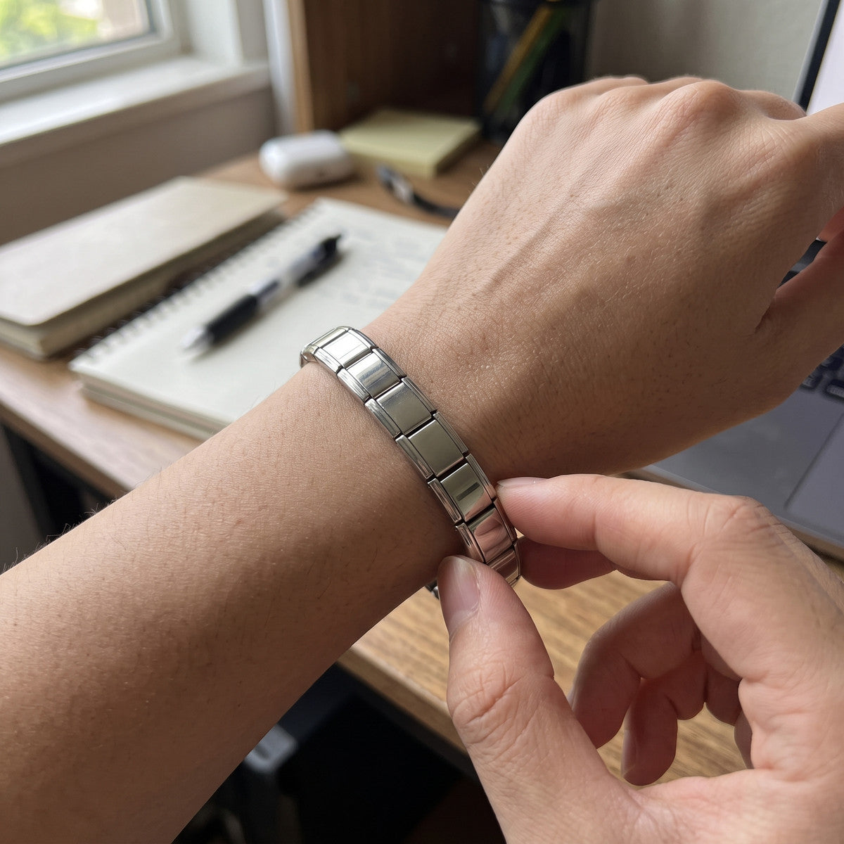 Little Links stainless steel bracelet in an everyday styling scene 14